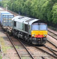 DRS 66419 crosses onto the main line at Fouldubs Junction in July 2008 with a trainload of containers from the WHM depot at Grangemouth. <br><br>[John Furnevel 02/07/2008]