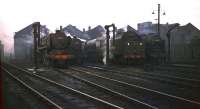 End of a busy day at Kingmoor in the early 1960s with locomotives on shed including (left to right) BR Standard class 6 72006 <I>Clan MacKenzie</I>, Stanier 8F 48136, Stanier Pacific 46255 <I>City of Hereford</I> and Royal Scot 46110 <I>Grenadier Guardsman</I>.<br><br>[Robin Barbour Collection (Courtesy Bruce McCartney) //]