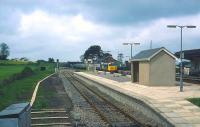 Looking across the island platform at Castle Cary (which had then just been rebuilt) at a class 50 hauling a Paddington bound express from the West of England in May 1985. <br>
<br><br>[John McIntyre 11/05/1985]