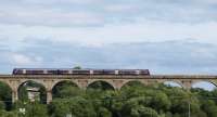 Markinch to Edinburgh local train shortly after leaving Markinch passes over Markinch Viaduct. FSR class 170.<br><br>[Brian Forbes 23/08/2008]