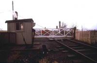 Mount Bures level crossing box on the Marks Tey to Sudbury line, looking north towards Sudbury in 1991, with early morning fog drifting in off the North Sea.<br><br>[Ian Dinmore //1991]