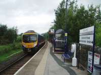 The Windermere train leaves Staveley formed of Pennine unit 185146. Staveley is a request stop but Trans Pennine have clearly spent money on the village station with automated train announcements, digital displays and CCTV. <br><br>[Mark Bartlett 30/08/2008]