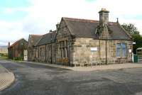 The road approach to Brora station, seen looking north on 29 August 2007. The surviving goods shed stands in the background.<br><br>[John Furnevel 29/08/2007]