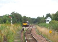 Formerly a four track main line through the heart of the Lancashire coalfield (Walkden was the NCB North West Area HQ) but all freight lines have gone now and there is just a simple two track layout, albeit with semaphores still controlled from the refurbished signal box. 150147 heads away from the island platform for Salford and Manchester. <br><br>[Mark Bartlett 01/09/2008]