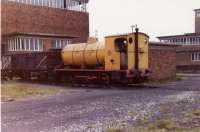 Hawthorn Fireless 0-6-0F Huncoat No.3 propels loaded 16T coal wagons into one of the tipplers in the Huncoat Power Station exchange sidings in 1975, a task it must have done innumerable times in the years since the station opened in 1956. The tyres on the loco look very worn but it continued in service for several more years. The power station closed in 1984.<br><br>[Mark Bartlett 22/05/1975]