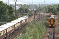 67017 brings the empty stock of <i>The Northern Belle</i> south into Millerhill yard on 20 September 2006. On the right a 158 is about to leave the reversing siding and run back to Newcraighall station, where it will form the next service to Dunblane.<br><br>[John Furnevel 20/09/2006]