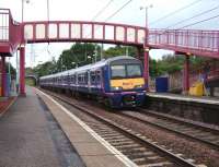 Westbound 322 481 calls at Curriehill on 6 September with one of the 2 daily revenue earning trips to Shields depot.<br><br>[David Panton 06/09/2008]