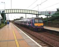 322 483 with a North Berwick - Edinburgh Waverley service at Wallyford on 6 September.<br><br>[David Panton 06/09/2008]