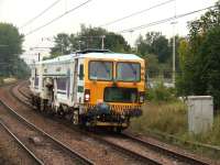 First Engineering Tamper DR 73914 <I>Robert McAlpine</I> passing west through Johnstone station on 5th September 2008<br><br>[Graham Morgan 05/09/2008]