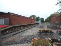 For a long time after closure in 1970 Thornton still had its long platform canopies but then became derelict after freight traffic ceased. Now in the care of a preservation group the station is looking much better although the modern building is encroaching the down platform. View towards Fleetwood. Can anyone confirm whether the canopy components from here were used in the station at Blackpool Pleasure Beach? [See image 19426] <br><br>[Mark Bartlett 09/09/2008]