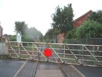 Hillylaid Crossing lies to the north of Thornton-Cleveleys station. The notice announces that the line from here to the station is under the care of the Poulton & Wyre Railway Society and their efforts can be appreciated here as the line north of the crossing is completely overgrown. View south at map ref SD 343427<br><br>[Mark Bartlett 09/09/2008]