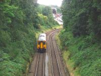 The deep, tree lined cutting south of Wilpshire tunnel sees 156473 dropping down towards the closed station at Wilpshire, the white building just visible on the bend, before it calls at Ramsgreave and Wilpshire, some 400 yds further on.  <br><br>[Mark Bartlett 06/09/2008]