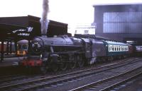 Black 5 no 45330 stands at Carlisle platform 3 in the mid 1960s at the head of a southbound special.<br><br>[Robin Barbour Collection (Courtesy Bruce McCartney) //]