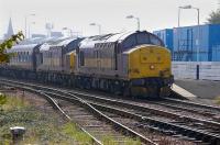 37401 and 37417 heading empty stock north from SRPS Boness to Aberdeen, passing through Kirkcaldy on 13 September 2008. The train was being moved in readiness for an Aberdeen - Kyle of Lochalsh charter scheduled to take place the following day.<br><br>[Bill Roberton 13/09/2008]