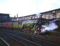 Preserved Gresley ex-LNER A3 Pacific no 4472 <I>Flying Scotsman</I> stands at Carlisle platform 4 in the 1960s with a southbound special.<br><br>[Robin Barbour Collection (Courtesy Bruce McCartney) //]