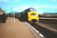 A class 37 stands at Georgemas Junction on 13 June 1983 prior to leaving on the final leg of its journey from Inverness to Thurso.<br><br>[Colin Alexander 13/06/1983]