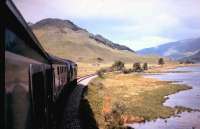 A Fort William - Mallaig train skirts the south shore of Loch Eilt in 1982.<br><br>[Colin Alexander //1982]