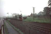 <h4><a href='/locations/S/St_Germains_Level_Crossing'>St Germains Level Crossing</a></h4><p><small><a href='/companies/N/North_British_Railway'>North British Railway</a></small></p><p>Flying Scotsman passing St Germains LC in June 1969 with a Hull Miniature Railway Society special. 43/132</p><p>08/06/1969<br><small><a href='/contributors/Bruce_McCartney'>Bruce McCartney</a></small></p>