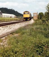 Class 33 on a Portsmouth - Cardiff service in Apr 1985 passing the closed SB at Warminster.<br><br>[John McIntyre /04/1985]