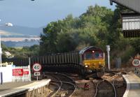 A Long train of HAAs climbing up through Dalmeny to reach the Forth Bridge.<br>
Coal trains to Longannet have now resumed using the Culross Line, which has caused the cancellation of a SRPS charter service due to lack of signalling between Dunfermline and Longannet.<br><br>[Brian Forbes /09/2008]