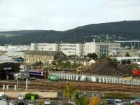 Demolition of the old carriage cleaning sheds is now complete. A more permanent fence is in place and landscaping of the site is in progress. Track has been relaid and there are three sidings visible inside the fence.<br><br>[John Gray 05/10/2008]