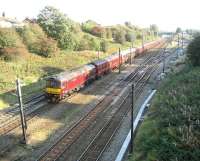 WCRC class 33 no 33025 hauls ecs off the <I>Cotton Mills Express</I> from Manchester Victoria back to Carnforth on 27 September 2008. The train is seen heading north on the Down Fast line at Farington Curve Junction.<br><br>[John McIntyre 27/09/2008]