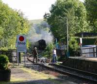 The term <I>'Walkies!'</I> takes on a whole new sense of urgency on the morning of 2 October 2008, as ex-SR class S15 4-6-0 No 825 puts in a sudden and unexpected appearance round the curve east of Sleights foot crossing with a through NYMR service from Whitby to Pickering.<br><br>[John Furnevel 02/10/2008]