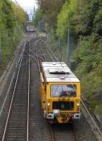 A tamper heads north from Jesmond Junction on 28 September. The  Metro line to Newcastle city centre bears right with the Manors spur, used for empty stock movements, running straight ahead.<br><br>[Bill Roberton 28/09/2008]