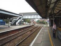 View east over the level crossing at Truro and towards the viaduct as the <I>Home Secretary</I> waits patiently to go for lunch. The lower quadrant semaphore is off for a Plymouth departure. <br><br>[Mark Bartlett 16/09/2008]