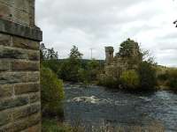 Photograph showing the the gap between the abutments over the River Dulnain to be spanned by the former Merry Street bridge following its relocation. [Photo with kind permission of the Strathspey Railway.]<br><br>[John Gray 10/10/2008]