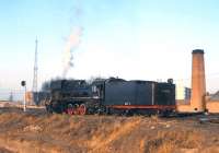 JS6096 near the depot at Daan Bei, Inner Mongolia, in April 2000.<br><br>[Peter Todd /04/2000]