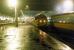 A class 37 stands at Queen Street between turns in 1989 with empty stock for Cowlairs Carriage Sidings as a DMU leaves the station on the right.<br><br>[Ewan Crawford //1989]