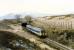 A sprinter enters the Cruach Rock Shed. This is not a true tunnel but a cutting with a cover to prevent blockage due to snow drifting.<br><br>[Ewan Crawford //1990]