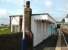 Scene at Kinghorn in May 2007 showing the up waiting room in the early stages of dismantling. Although it appeared in reasonable external condition the structure had been declared unsafe and had been out of use for some time.<br><br>[David Panton 25/05/2007]