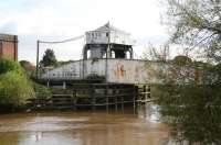 The swing bridge just east of Selby station looking down river on 29 September 2008. Prior to the rerouting of the ECML south of York in 1983, which resulted in closure of the section between Chaloners Whin Junction and Riccall, the old bridge carried the route across the River Ouse. For the view from the bridge control cabin [see image 18371].<br><br>[John Furnevel 29/09/2008]