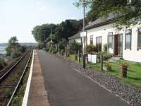 The original station buildings at Lelant are now a home overlooking the platform and estuary. Trains only call here in the morning and evening but all trains stop at Lelant Saltings, just beyond the bend in this view south towards St Erth. <br><br>[Mark Bartlett 18/09/2008]