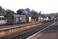 An engineers train runs through Tulse Hill station, South London, in 1973.<br><br>[Ian Dinmore //1973]