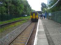 It is very unusual on the Preston to Ormskirk line for a train to run on a Sunday. The 6th of July however was an exception when Network Rail & Northern Rail laid on a free train service to coincide with Community Rail Day. One of the Ormskirk bound services is seen waiting to depart.The unused platform on the left has recently been cleared and both platforms have been securely fenced.<br><br>[John McIntyre 06/07/2008]