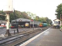 The Bodmin and Wenford Railway depot can be seen from the station platform at Bodmin General. On this day T9 4-4-0 30120 was on shed [see image 41020] with BRCW 33110 and 08444. Just behind the signal box is another small shed that contained the former Fowey Docks Class 10 D3452 and Beattie Well Tank 30587. <br><br>[Mark Bartlett 15/09/2008]