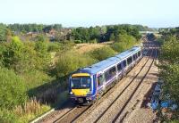 Edinburgh - Bathgate train approaching Livingston North on 8 October prior to the introduction of double line working.<br><br>[James Young 08/10/2008]