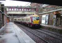 Gourock bound 334 012 leaving Greenock West on 15 October and about to enter Newton Street Tunnel, Scotlands longest, running to Fort Matilda.<br><br>[David Panton 15/10/2008]