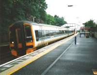 The 1712 service from Glasgow Queen Street to Edinburgh and Kirkcaldy splits at Falkirk High in July 1998, with the front set for Waverley.<br><br>[David Panton 14/07/1998]