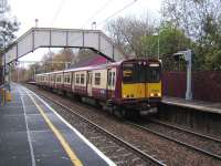 Train for Neilston at Williamwood on 10 November 2007, emu 314 214.<br><br>[David Panton 10/11/2007]