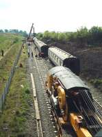 Clearing up work in progress on the Sunday morning following the derailment on the ECML at Prestonpans in the 1970s.<br><br>[Bruce McCartney //]