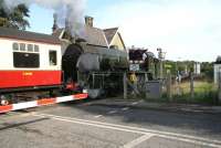 Ex-SR class S15 4-6-0 No 825 about to cross the Esk at Ruswarp on 2 October with a through Pickering - Whitby service. The bridge once carried a double track railway as well as a now deckless foot crossing (nearest the camera).<br><br>[John Furnevel 02/10/2008]