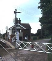 Level crossing and box at Havenhouse station on the Skegness branch in June 1979.<br><br>[Ian Dinmore 12/06/1979]