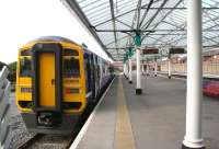 A Northern 158 waits in bay platform 6 at Bridlington on 1 October where it will form the 1010 service to Hull and Sheffield. Once a busy seaside excursion station, Bridlington boasted 8 platforms in its heyday. The 1970s housing beyond the fence on the far right of the picture stands on the site of the original platforms 1-3, while the former excursion platforms 7&8 (located to the left of the train) were taken out of use prior to resignalling work in 2000. In addition to the bay, the 2 remaining operational platforms (4&5) can be seen on the right.<br><br>[John Furnevel 01/10/2008]