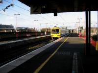 A Central Trains service comes to the end of its journey as it arrives at Birmingham International on a sunny 29 November 2006.<br><br>[John McIntyre 29/11/2006]