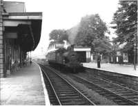 Push Pull for Bacup at Rawtenstall with L&YR 2-4-2T 50647. Believed to have been taken around 1951 and certainly prior to the introduction of DMUs in 1955. Rawtenstall was then a through station but, following closure in 1972, has now been rebuilt as the terminus of the preserved East Lancashire Railway. This view is to the south towards Ewood Bridge and Bury.<br><br>[W A Camwell Collection (Courtesy Mark Bartlett) //1951]