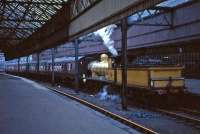 Jones Goods inside Princes Pier station, Greenock, with the 1965 Scottish Rambler<br><br>[G W Robin 17/04/1965]